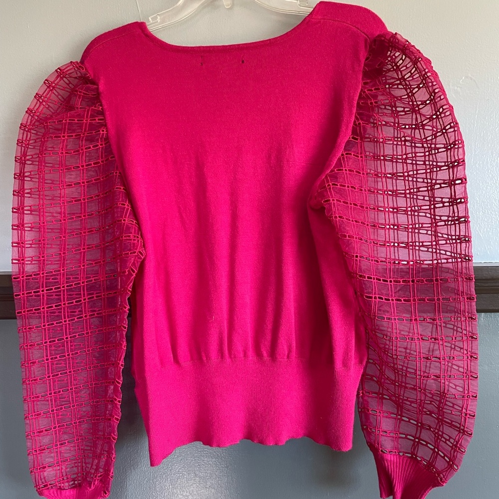 Pink Joseph A long sleeved mesh arm shirt.